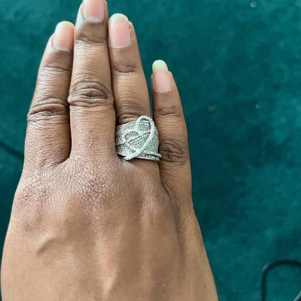 Silver ring with diamond accents